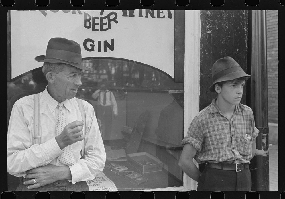 [Untitled photo, possibly related to: Boy in front of liquor store, Newark, Ohio]. Sourced from the Library of Congress.