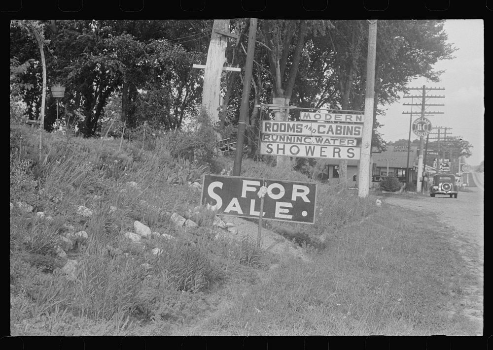 Tourist signs on the highway, central Ohio (see general caption). Sourced from the Library of Congress.