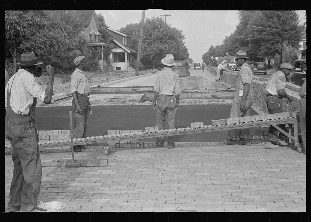 Workmen repairing Route 40, central Ohio. Sourced from the Library of Congress.