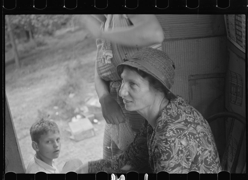 Farm woman in conversation with relief investigator, West Virginia. Sourced from the Library of Congress.