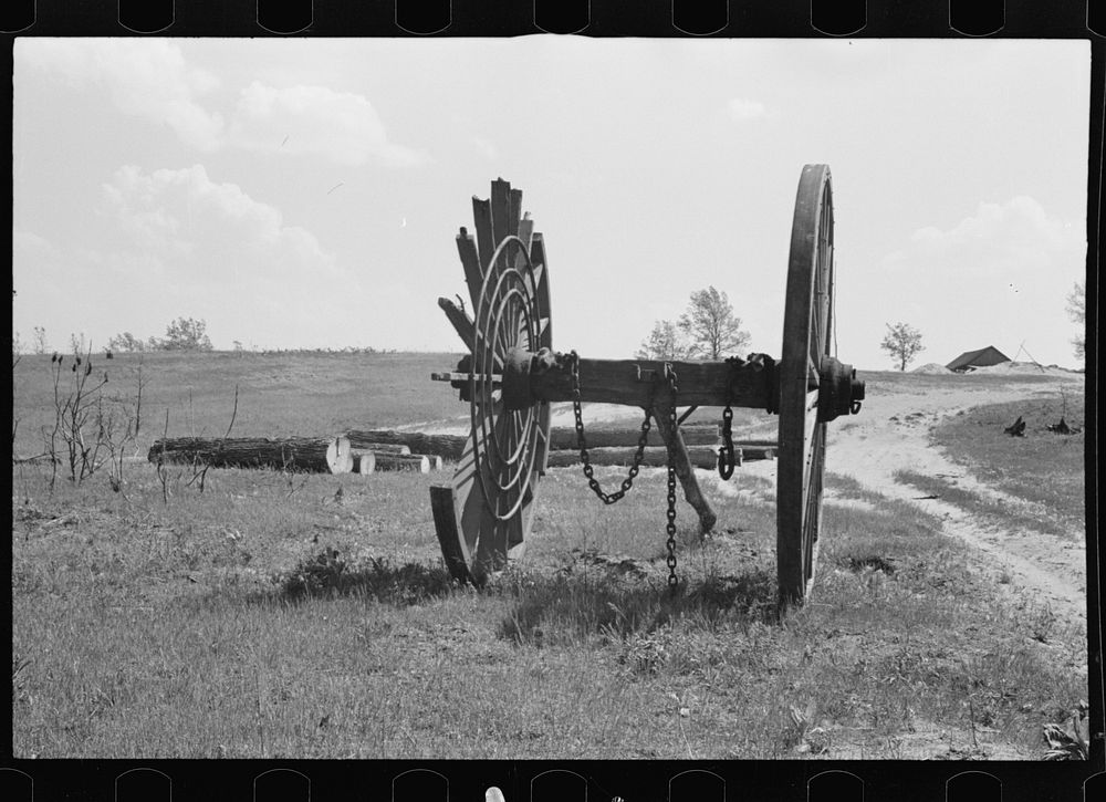 Giant wheels ten feet in diameter, once used for carrying logs to sawmill, Michigan. Sourced from the Library of Congress.