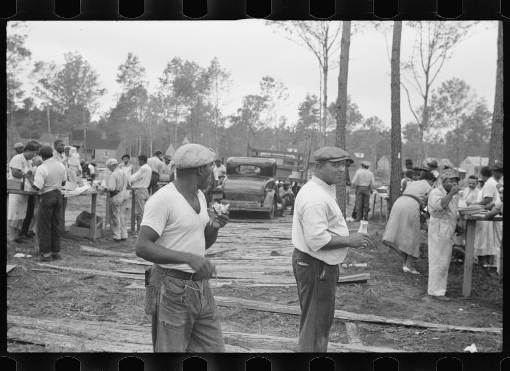 [Untitled photo, possibly related to:  workmen having lunch, Newport News Homesteads, Virginia]. Sourced from the Library of…