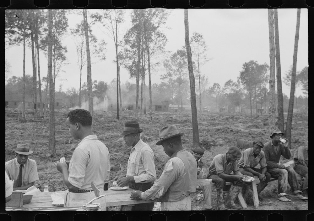 [Untitled photo, possibly related to:  workmen having lunch, Newport News Homesteads, Virginia]. Sourced from the Library of…
