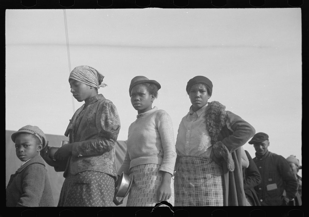 [Untitled photo, possibly related to: es in the lineup for food at meal time in the camp for flood refugees, Forrest City…