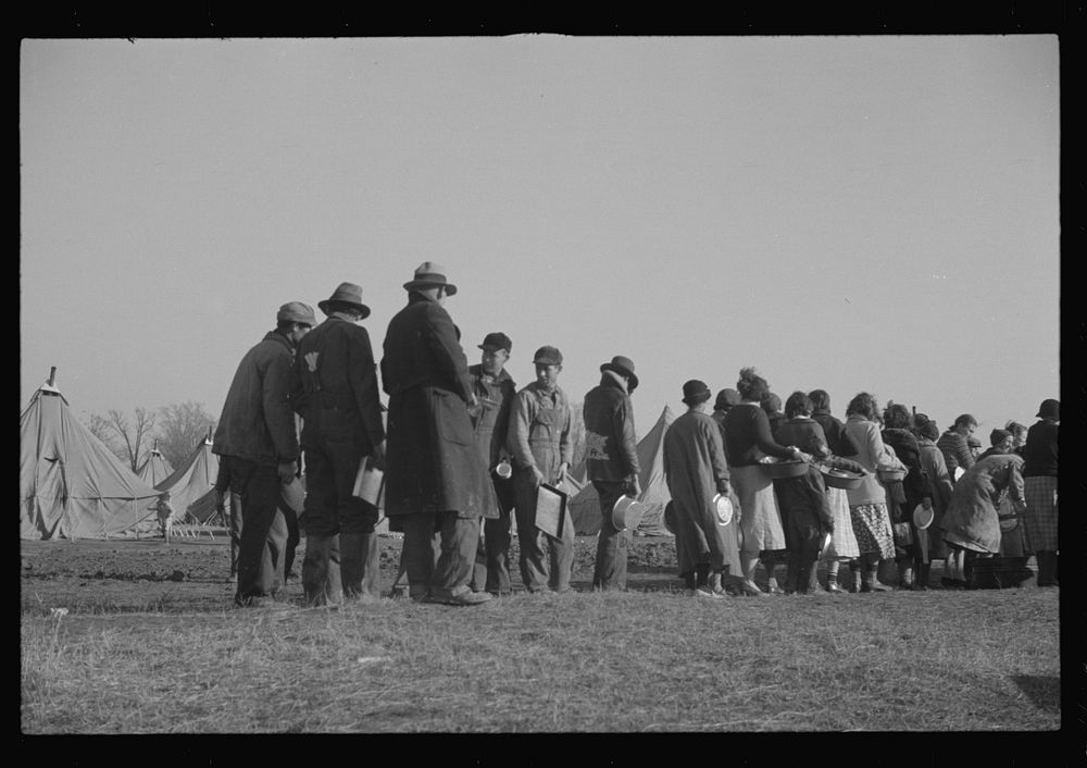 [Untitled photo, possibly related to: es in the lineup for food at the flood refugee camp, Forrest City, Arkansas]. Sourced…