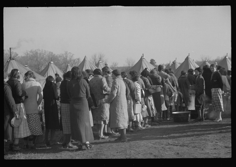 [Untitled photo, possibly related to: Refugees lined up at meal time in the camp for white flood refugees in Forest City…