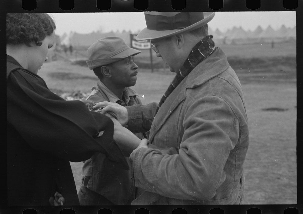 [Untitled photo, possibly related to: Vaccination in the camp for  flood refugees at Marianna, Arkansas]. Sourced from the…