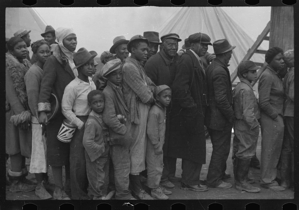 [Untitled photo, possibly related to: Flood refugees at mealtime, Forrest City, Arkansas]. Sourced from the Library of…