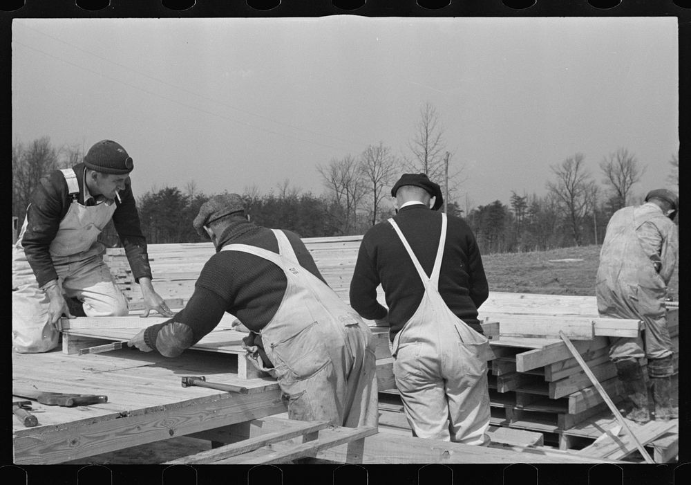 [Untitled photo, possibly related to: Carpenter at the Greenbelt Project, Berwyn, Maryland]. Sourced from the Library of…