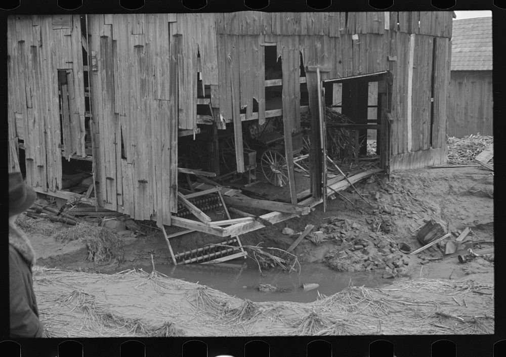Barn and farm equipment ruined by flood waters. Hatfield, Massachusetts. Sourced from the Library of Congress.