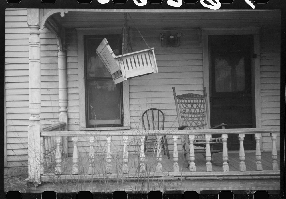 Mayetta, Kansas. Porch swing up for the winter. Sourced from the Library of Congress.