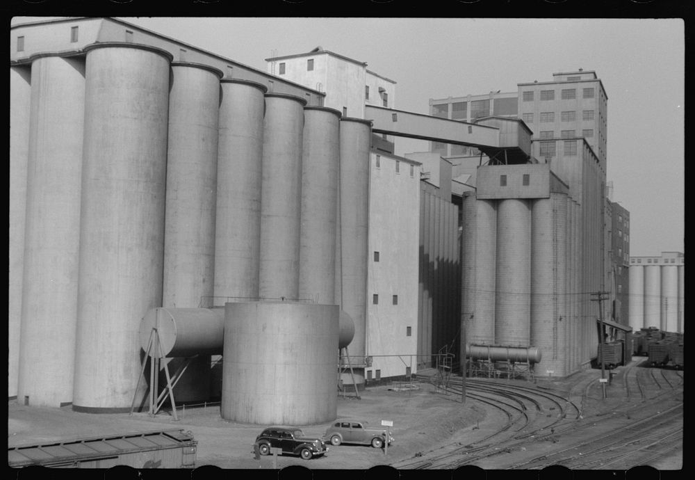 [Untitled photo, possibly related to: Elevators at Quaker Oats plant. Cedar Rapids, Iowa]. Sourced from the Library of…