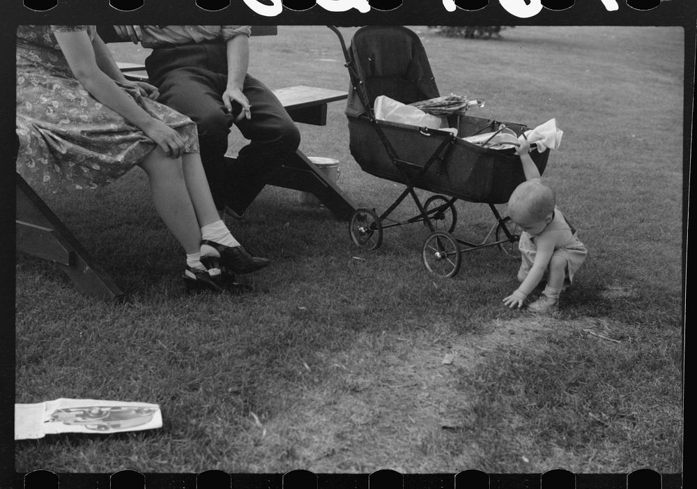 [Untitled photo, possibly related to: Sunday afternoon in the park. Vincennes, Indiana]. Sourced from the Library of…