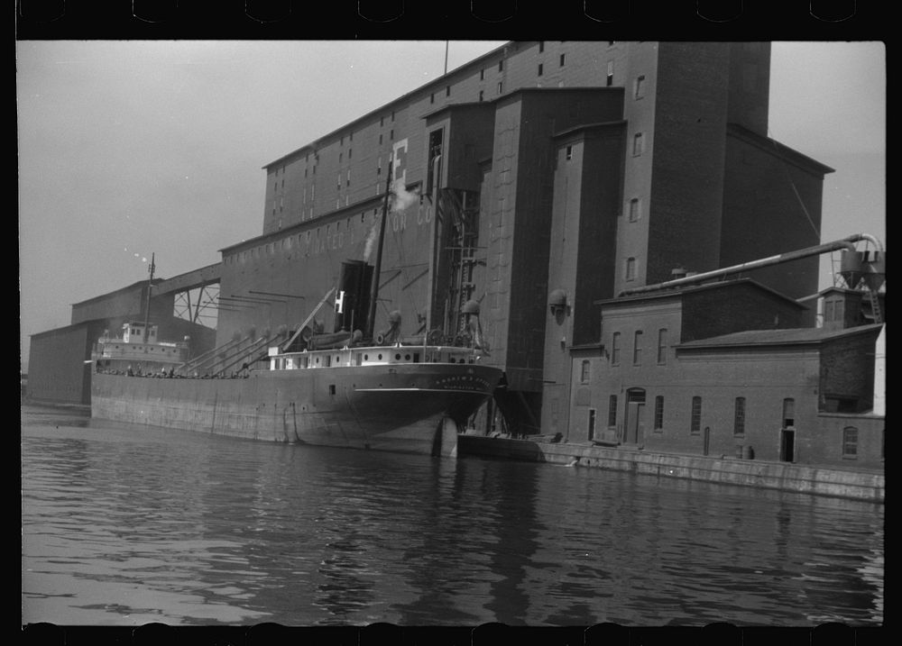 [Untitled photo, possibly related to: Grain boat at elevator. Duluth, Minnesota]. Sourced from the Library of Congress.