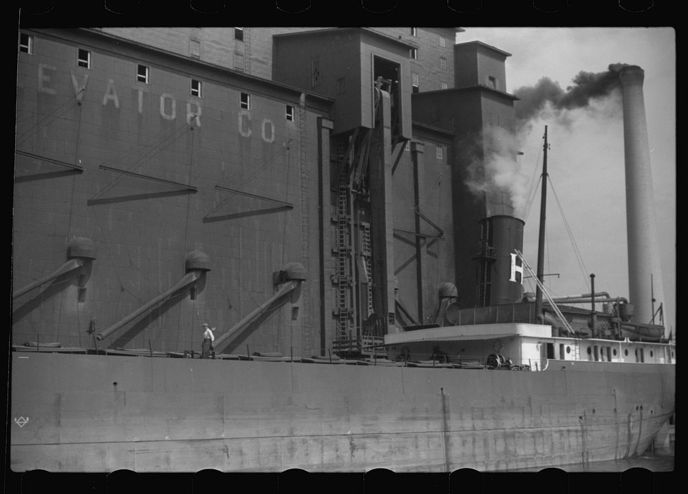 [Untitled photo, possibly related to: Loading grain boat. Duluth, Minnesota]. Sourced from the Library of Congress.