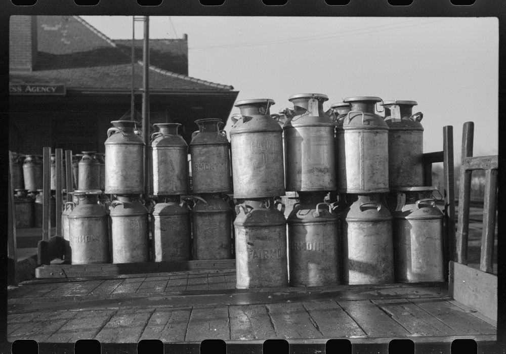[Untitled photo, possibly related to: Milk cans at Railroad station. Minot, North Dakota]. Sourced from the Library of…