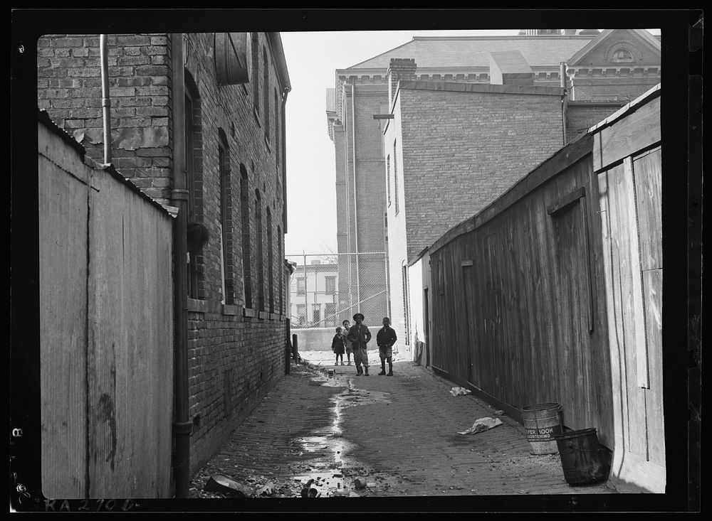 Alley near L Street, N.W. Blake School in background. Washington, D.C.. Sourced from the Library of Congress.