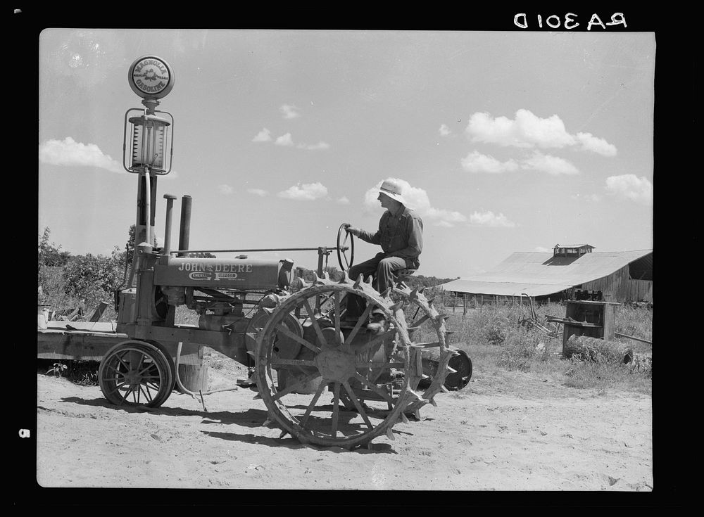 Stortz cotton plantation, Arkansas. Tractor and operator. Sourced from the Library of Congress.