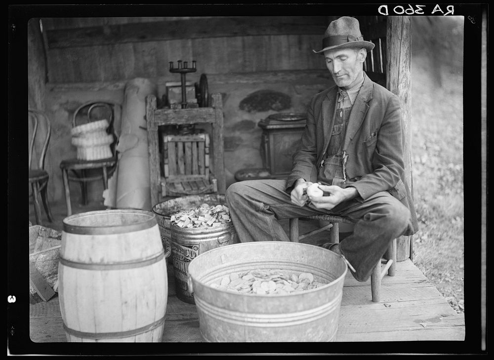 John Nicholson peeling apples. Shenandoah National Park, Virginia. Sourced from the Library of Congress.
