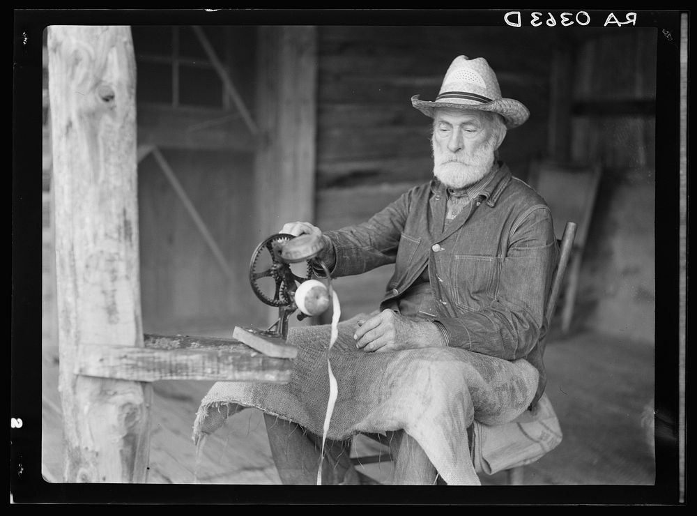 Russ Nicholson peeling apples. Shenandoah National Park, Virginia. Sourced from the Library of Congress.