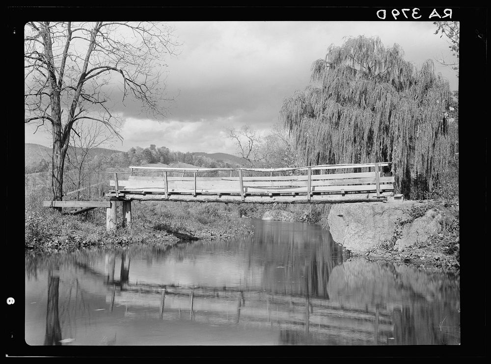 Low bridge across Hughes River at the foot of the Blue Ridge Mountains. Nethers. Shenandoah National Park, Virginia. Sourced…