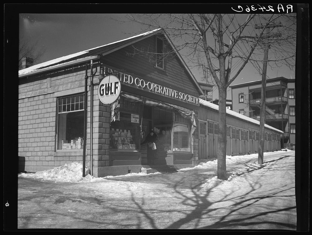 Neighborhood grocery store owned by United Cooperative Society. Fitchburg, Massachusetts. Sourced from the Library of…