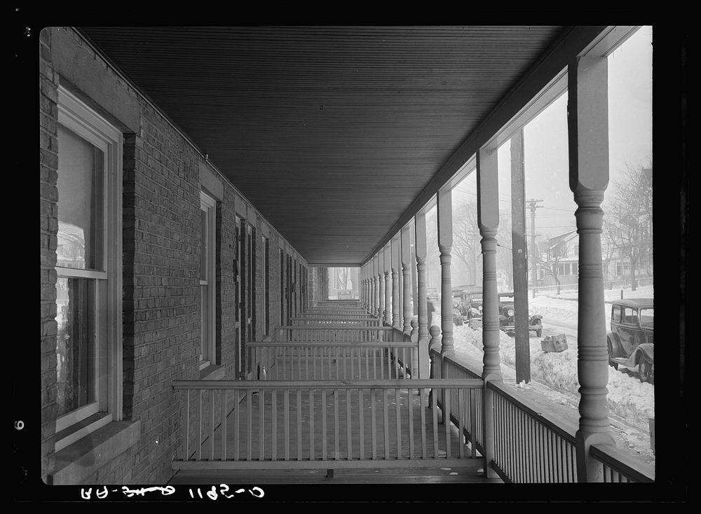 Back porches of a series of identical houses. Bound Brook, New Jersey. Sourced from the Library of Congress.