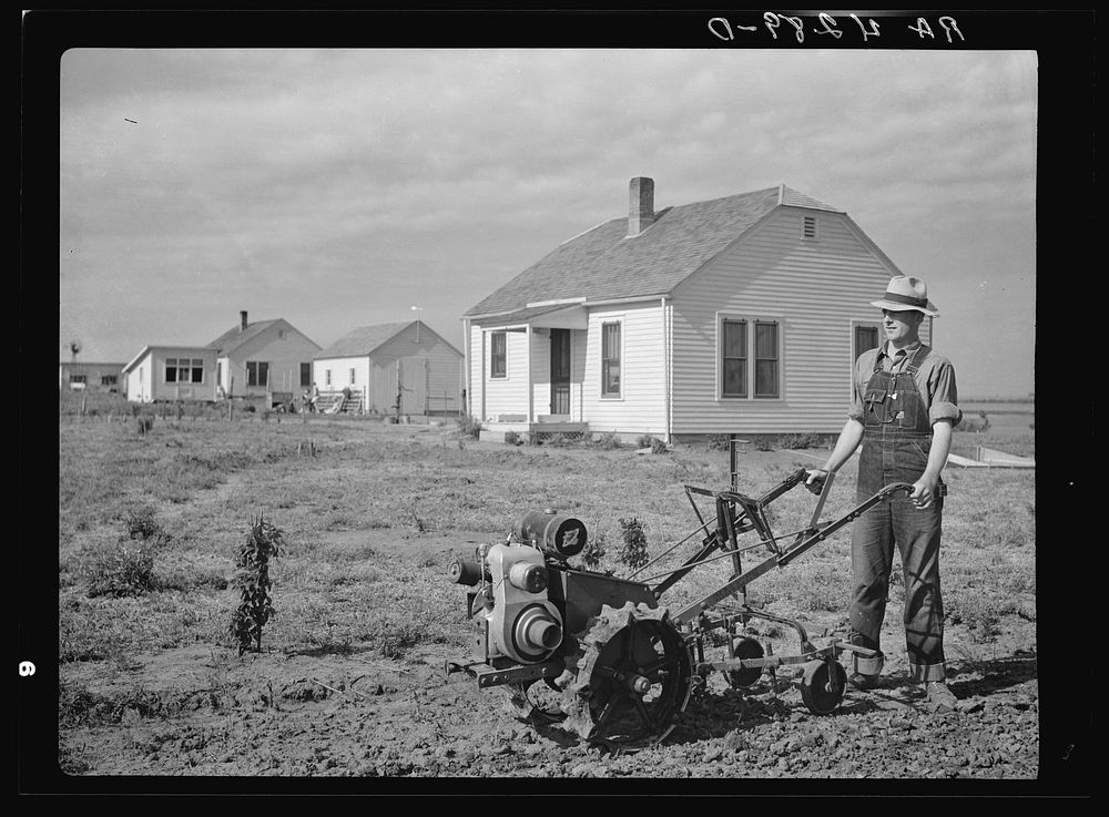 Using a hand tractor for cultivation. Falls City Farmsteads, Nebraska. Sourced from the Library of Congress.