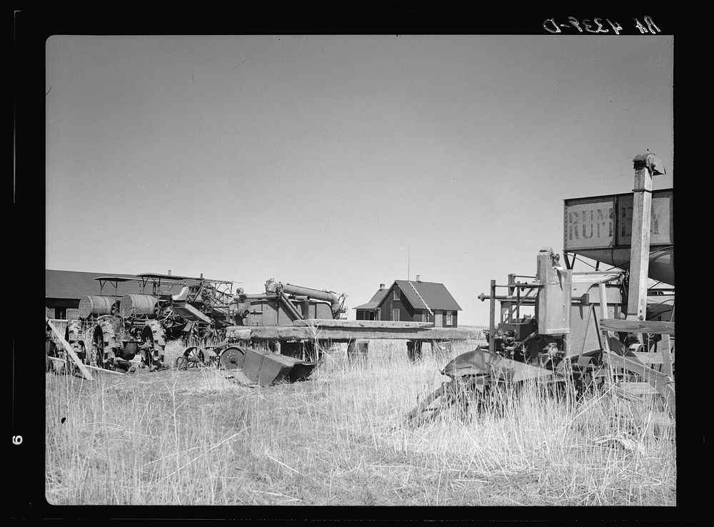Home of wheat farmer-speculator. Cheap house and heavy investment in machinery. Box Butte County, Nebraska. Sourced from the…