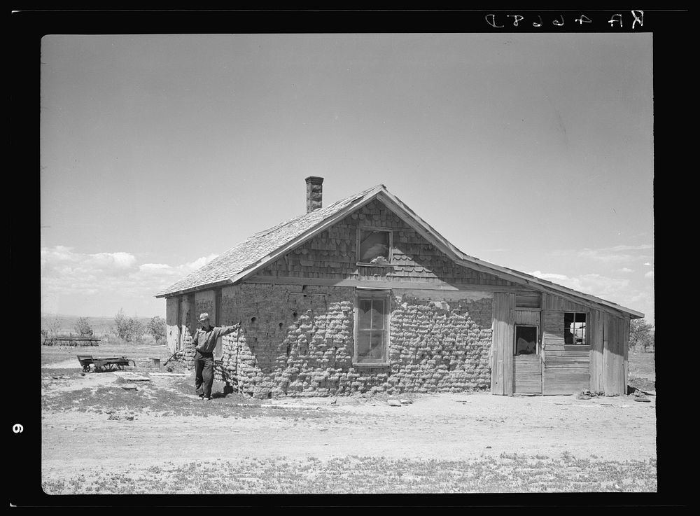 Sod house in which this man's father homesteaded thirty years ago. Pennington County, South Dakota. Sourced from the Library…