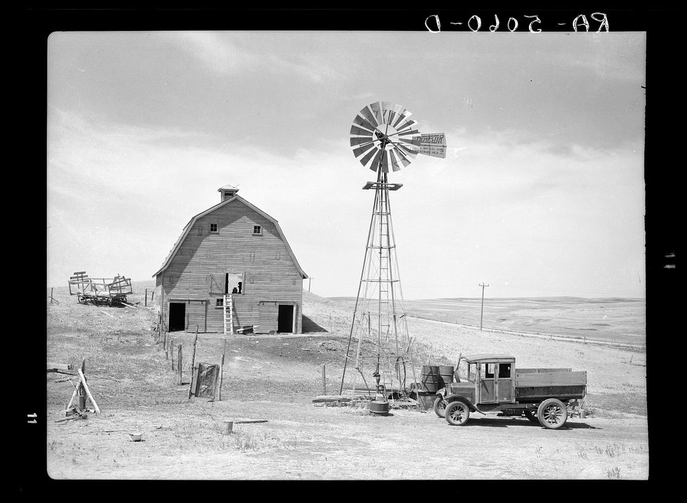 Empty barns and idle trucks are found throughout the drought area. Beach, North Dakota. Sourced from the Library of Congress.