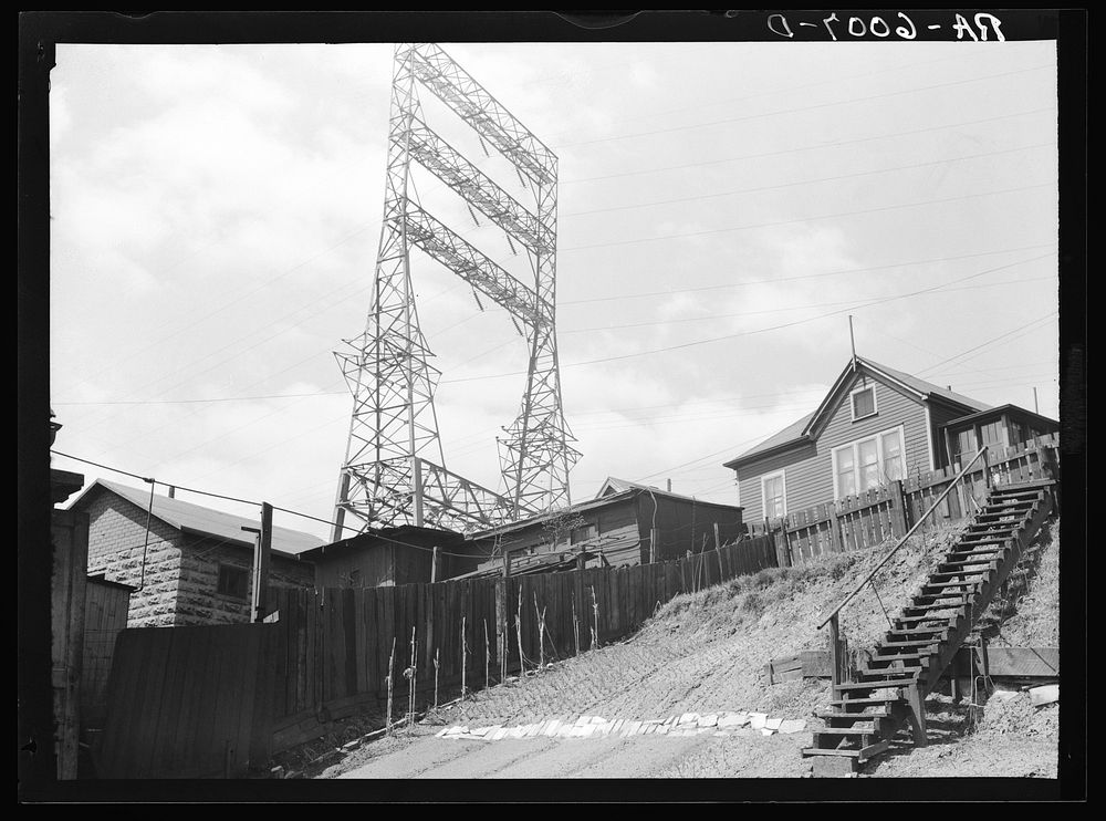 Housing alongside electric railroad. Milwaukee, Wisconsin. Sourced from the Library of Congress.