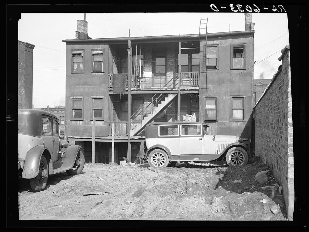 Rear of apartment house between Juneau and McKinley Streets. Milwaukee, Wisconsin. Sourced from the Library of Congress.