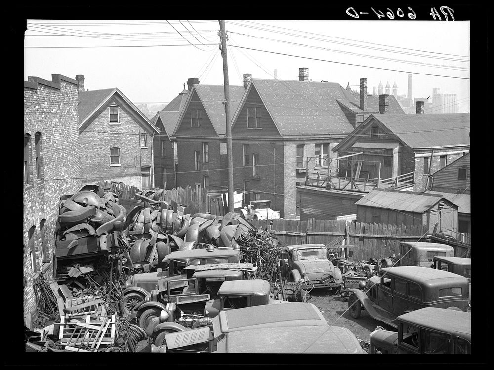 Junk, with living quarters close by. Milwaukee, Wisconsin. Sourced from the Library of Congress.