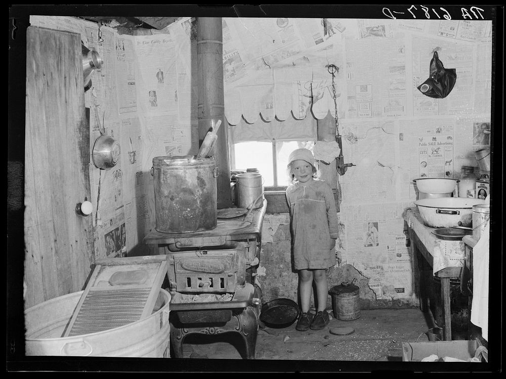 Kitchen of Ozarks cabin purchased for Lake of the Ozarks project. Missouri. Sourced from the Library of Congress.