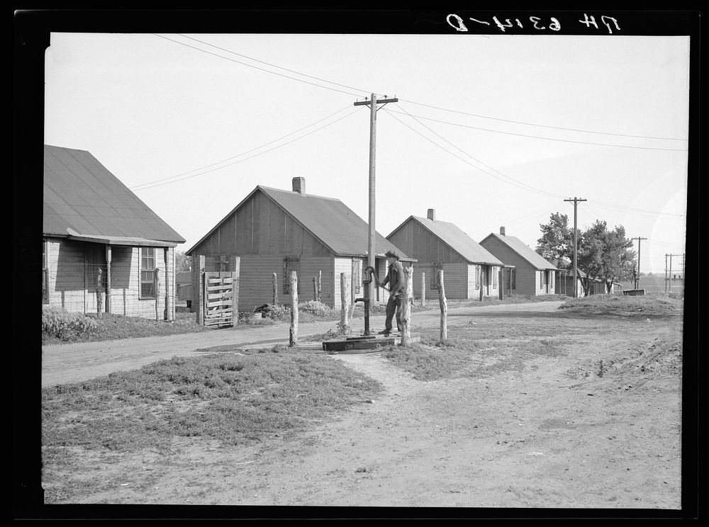 Street scene in the mining settlement of Zookspur, Iowa, where part of the occupants of the Granger Homestead formerly…