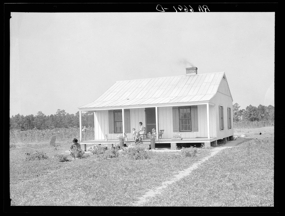 Family resettled in house on Irwinville Farms, Georgia. Sourced from the Library of Congress.