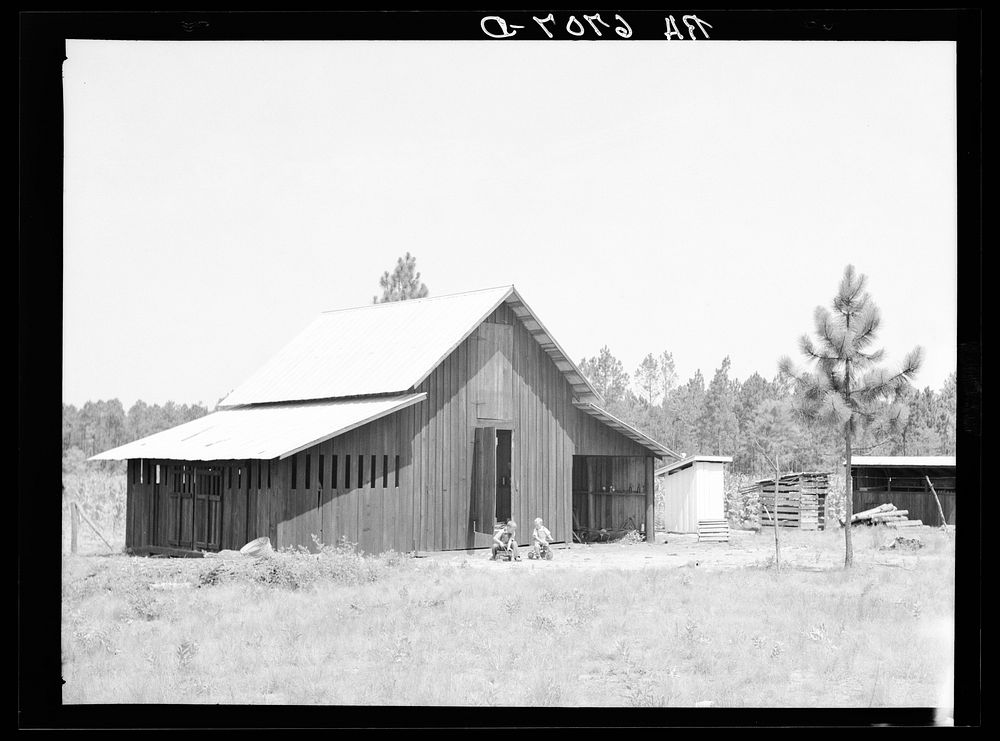 "Bryan" barn on rural resettlement farm unit in Irwinville Farms, Georgia.  This barn, designed and built under supervision…