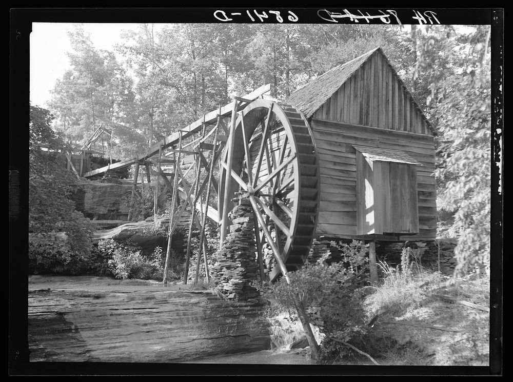 Waterwheel at active grist mill. Owner is Logan Maxwell. It is three miles from Cornelia, Georgia. Sourced from the Library…