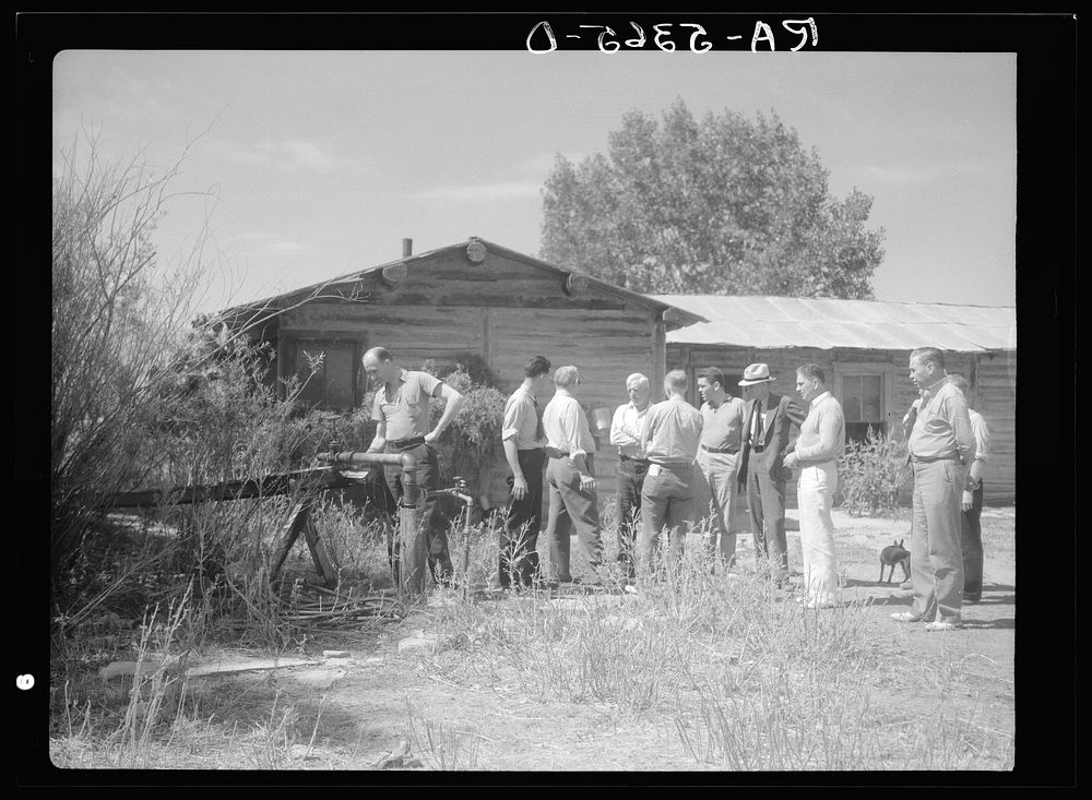 Drought committee stops for drink at artesian well on farm near Broadus, Montana. Sourced from the Library of Congress.