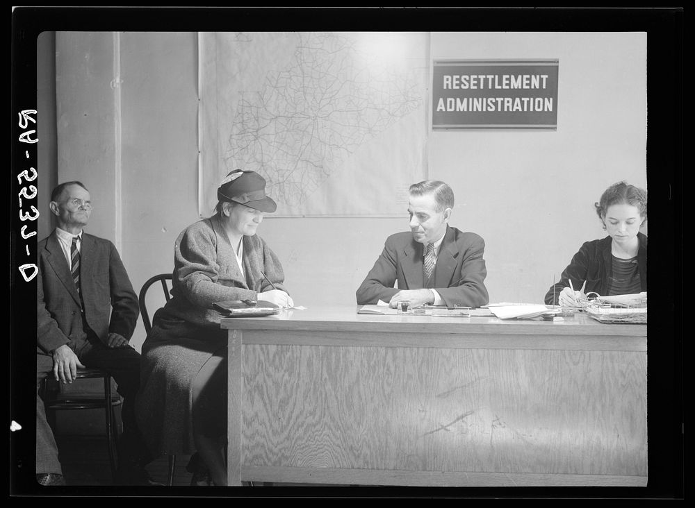 Making payments on rehabilitation loans. Raleigh, North Carolina. Sourced from the Library of Congress.