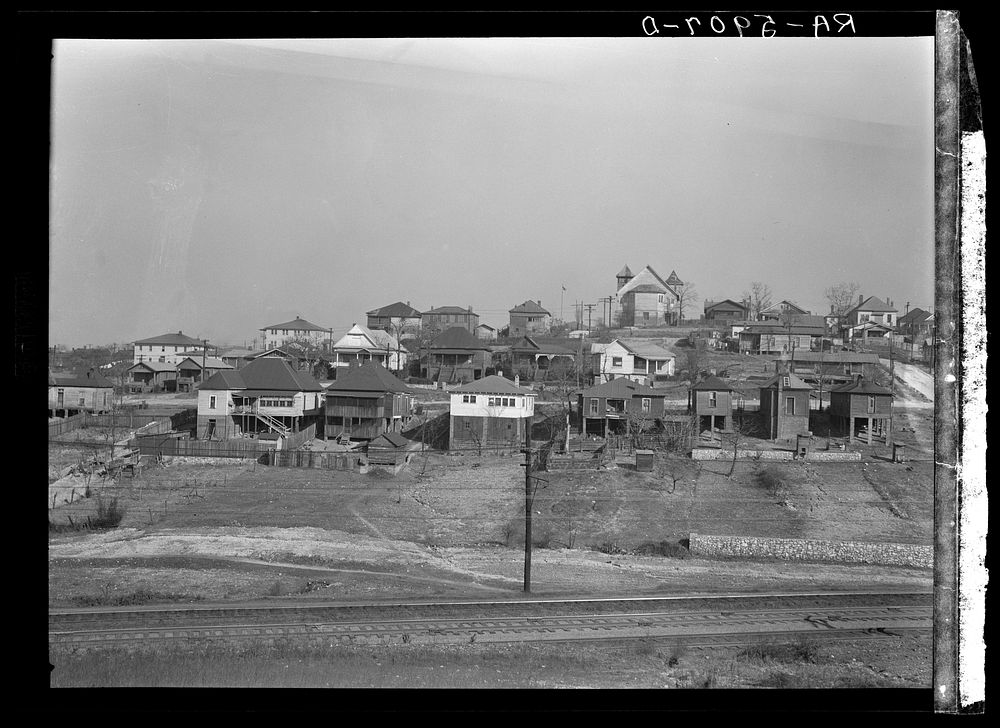 Backyards and house in Birmingham, Alabama, district from which have come some of the residents of the housing project.…