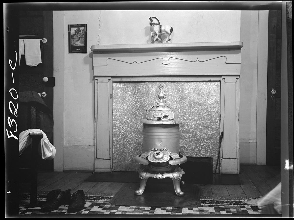Stove in bedroom of house at Enfield, North Carolina. Sourced from the Library of Congress.