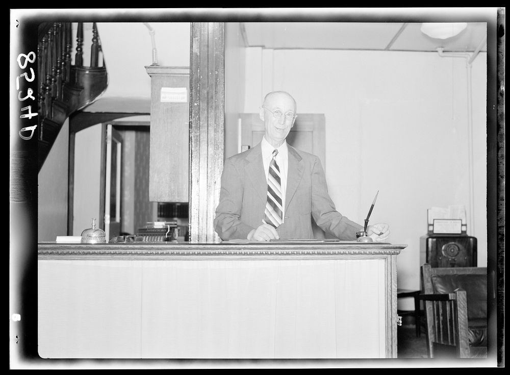 Hotel clerk. Dover, Delaware. Sourced from the Library of Congress.