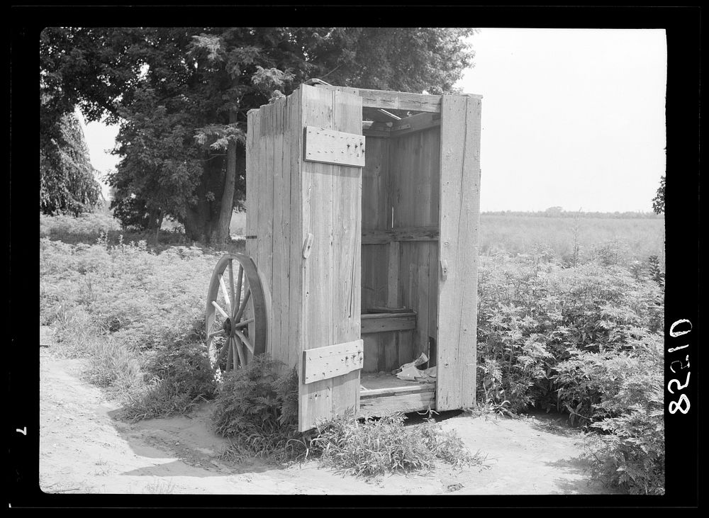 Privy on wheels for use of field workers at the King Farm near Morrisville, Pennsylvania. Sourced from the Library of…