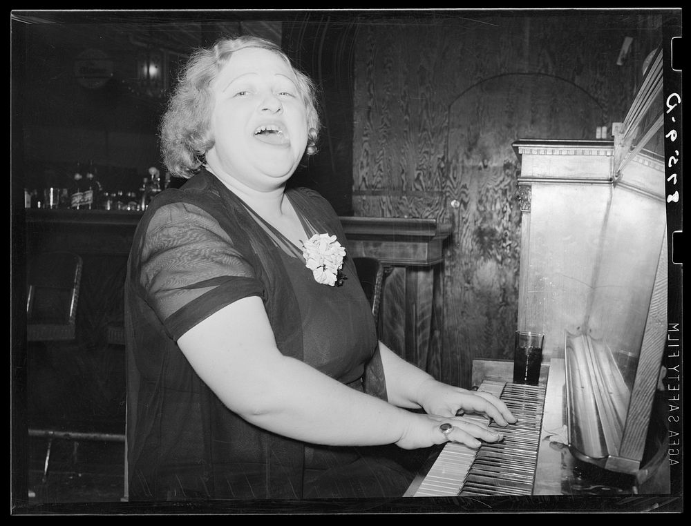 Mildred Irwin, entertainer in saloon at North Platte, Nebraska. She entertained for twenty years in Omaha before coming to…
