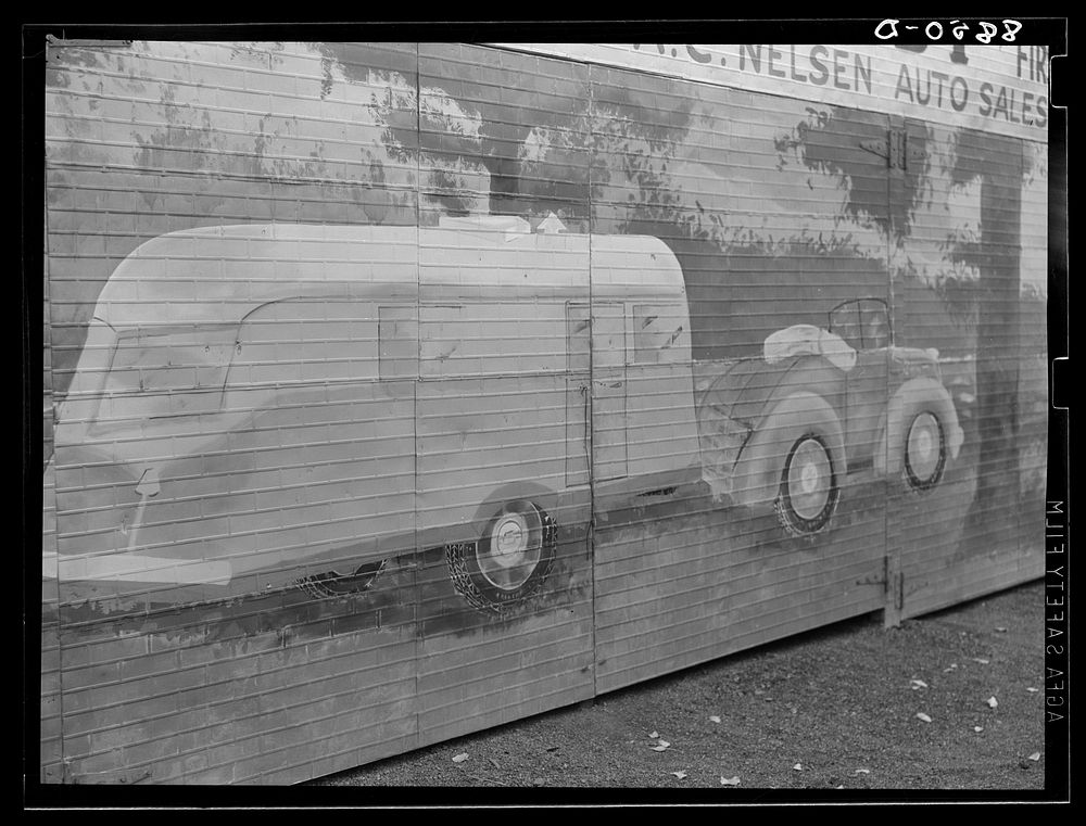 Mural on auto sales lot. Omaha, Nebraska. Sourced from the Library of Congress.