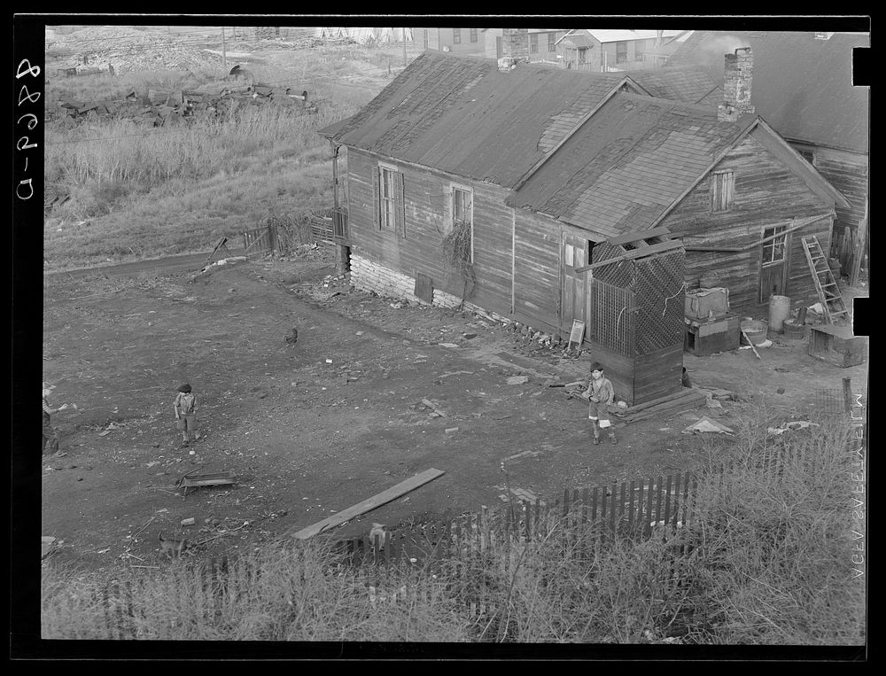 House along the railroad tracks. Omaha, Nebraska. Sourced from the Library of Congress.