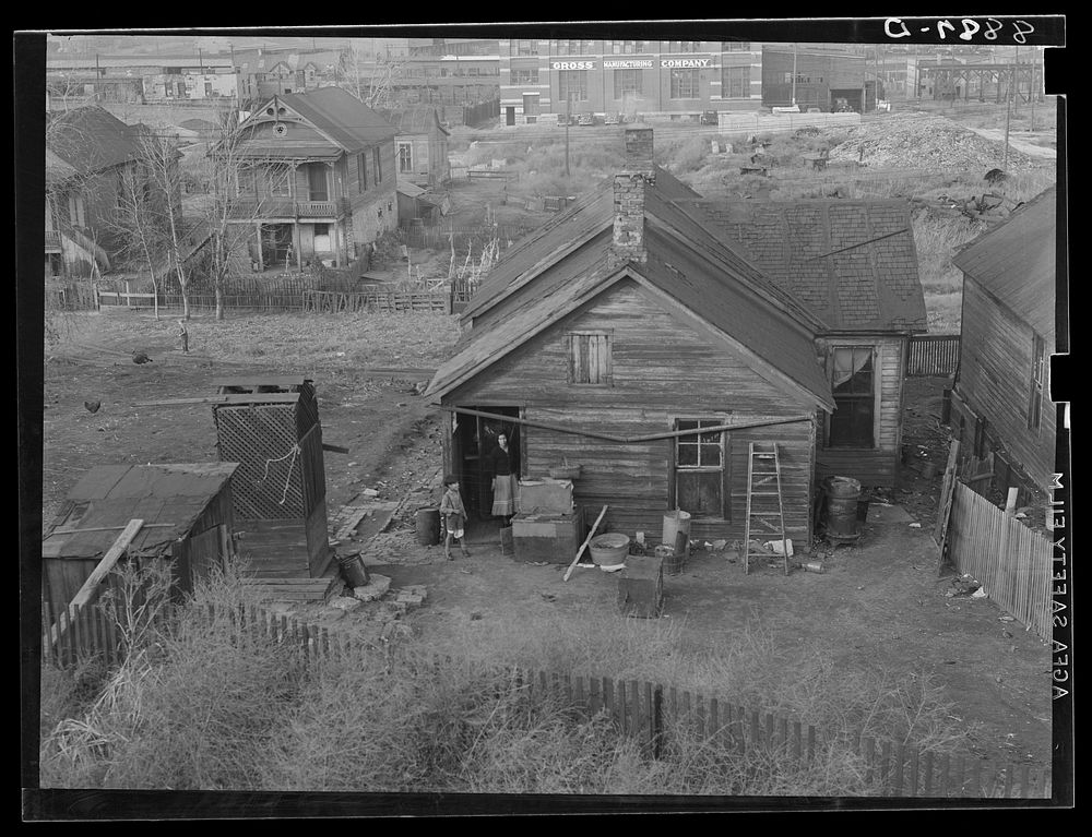 Houses along the railroad tracks. Omaha, Nebraska. Sourced from the Library of Congress.