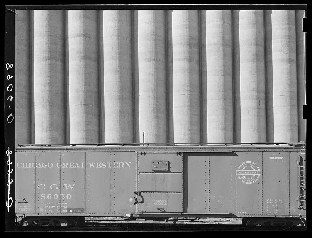 Freight car and grain elevators. Omaha, Nebraska. Sourced from the Library of Congress.